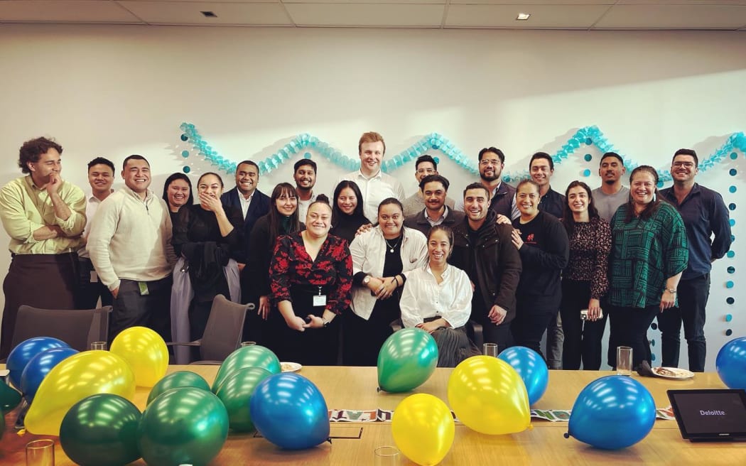 Lisa Tai (front centre) with the Pås Peau team at Deloitte