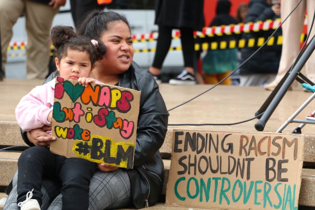 Protesters with their signs in Aotea Square, Auckland at the Black Lives Matter rally on 14 June, 2020.