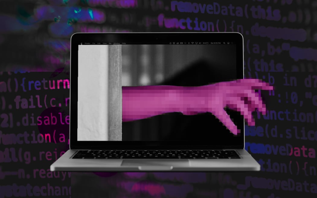 Composite of hand reaching through computer screen