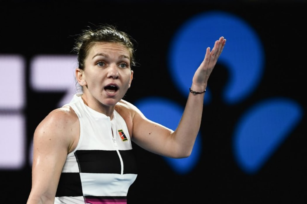 Romania's Simona Halep reacts after a point against Sofia Kenin of the US on day four of the Australian Open tennis tournament in Melbourne on January 17, 2019.