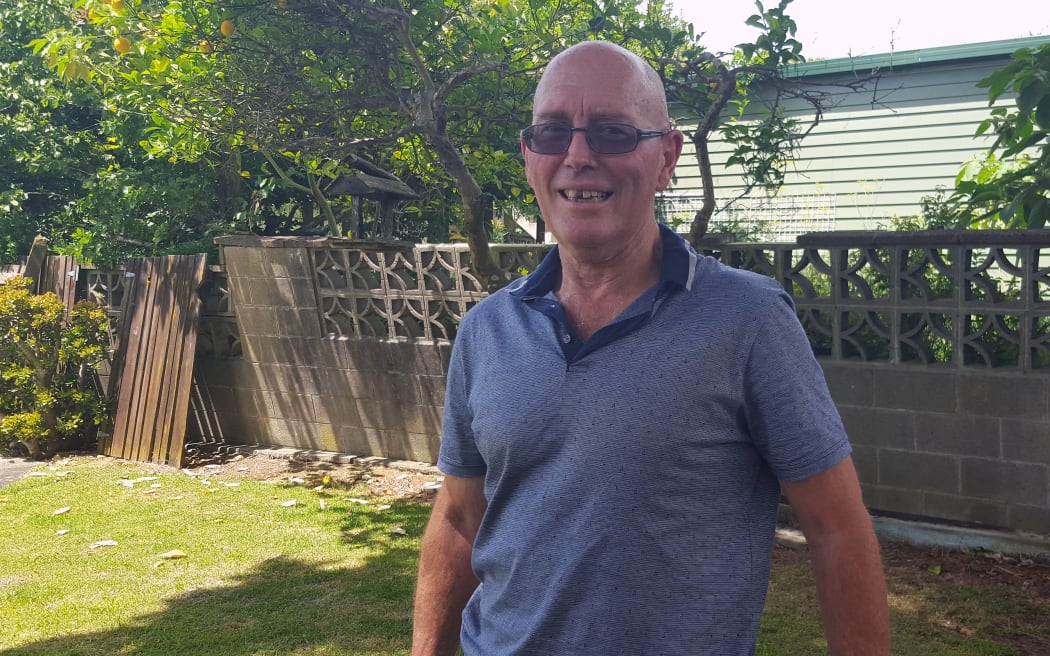 Man stands in his garden
