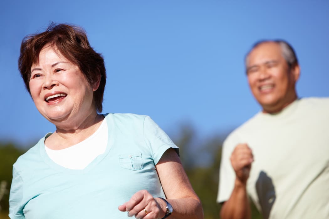 Senior couple jogging
