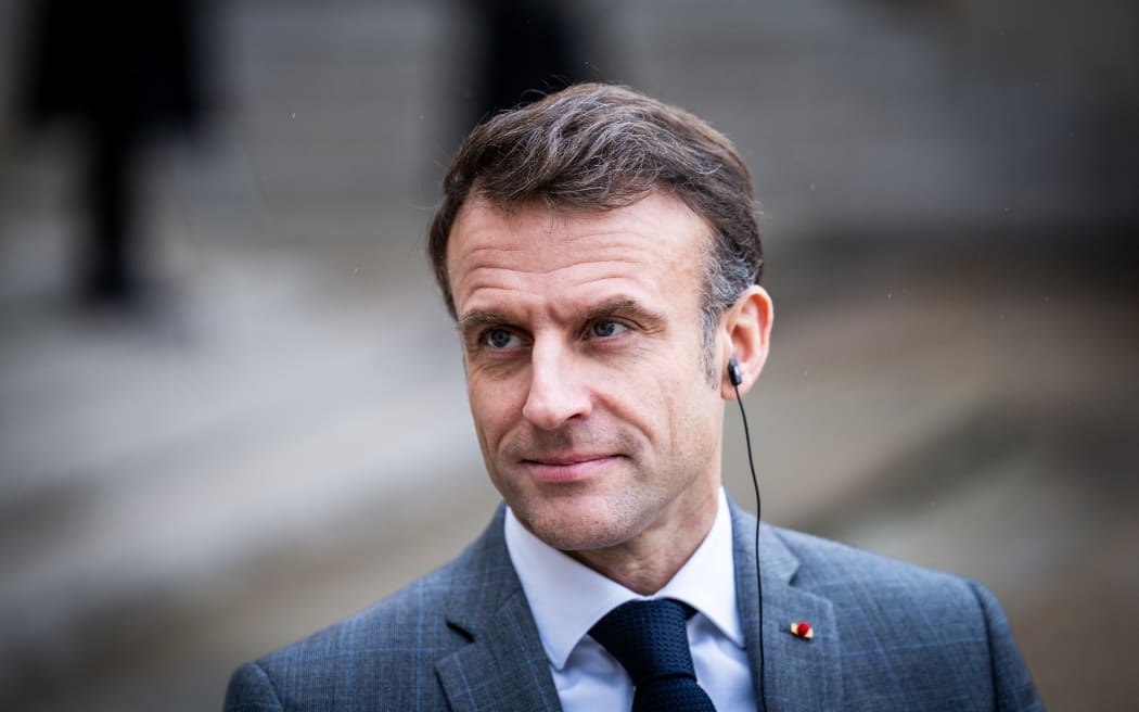 French President Emmanuel Macron pictured outside of Élysée Palace on 13 December, 2023.