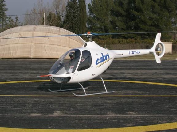 A two seat 2011 Guimbal Cabri helicopter.