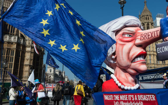 A float with a caricature of British Prime Minister Theresa as Pinocchio stands outside the Houses of Parliament during pro-EU protest on 01 April, 2019 in London, England.