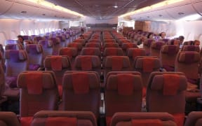 Emirates airline, based in Dubai, UAE, is the largest operator of the Airbus A380-800. They expect soon their 100th plane and have 45 more in order. First class in A380 are closed suites, in Business class there are flat bed seats and in economy standard reclining seat with 18 inch seat width and 32-34 inch seat pitch. Every seat is equipped with inflight power with various adapters and individual entertainment system IFE. There is free wifi internet and a cheap unlimited option. In all seat various meals and beverages are provided. In the upper classes like Business or First there is available a bar in the upper floor with a lobby and a first class shower suite. 
 (Photo by Nicolas Economou/NurPhoto) (Photo by Nicolas Economou / NurPhoto / NurPhoto via AFP)