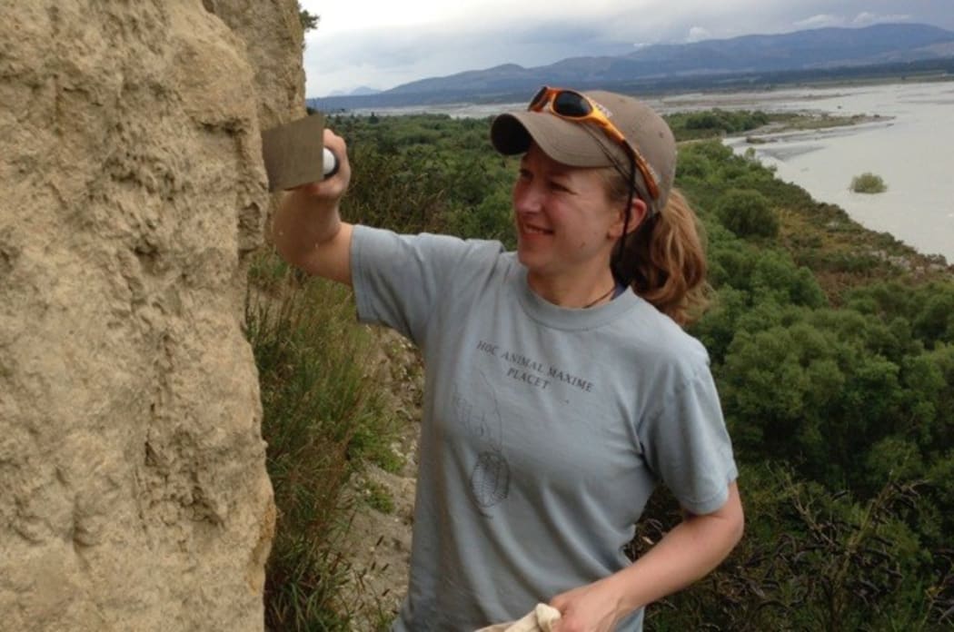 Bess Koffman prepares to collect a sample from the Barr Hill loess deposit, near the Rakaia River