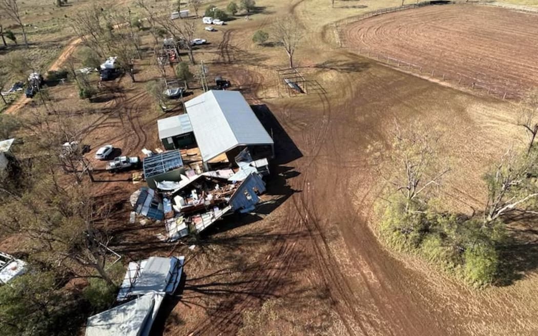 The Camboon Campdraft Hall was completely destroyed on Saturday as wedding guests sheltered inside.