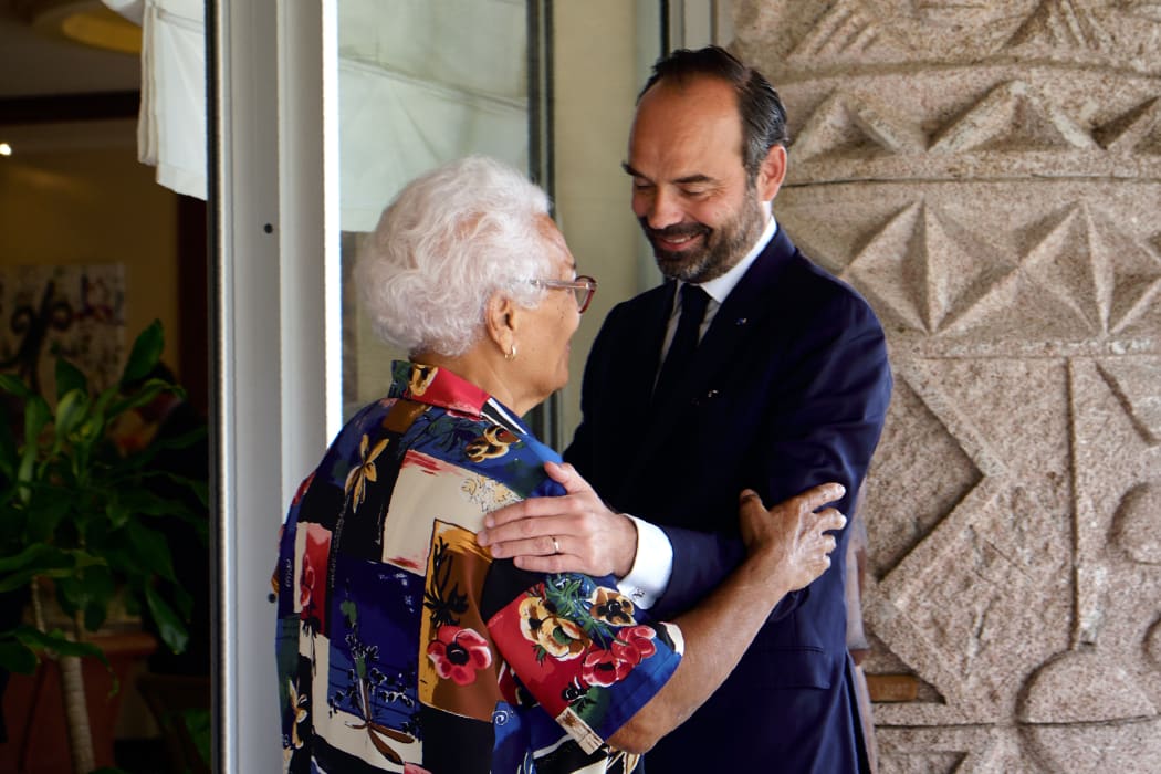 French Prime Minister Edouard Philippe (R) greets Marie-Claude Tjibaou, widow of the historical independence leader Jean-Marie Tjibaou at the French High Commission on November 5, 2018 in Noumea, New Caledonia.
