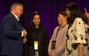 Mark Mitchell with ethnic women entrepreneurs.