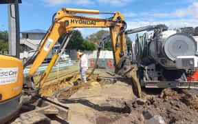 Watercare crew work to repair pipeline on Remuera Road on 13 February, 2024.