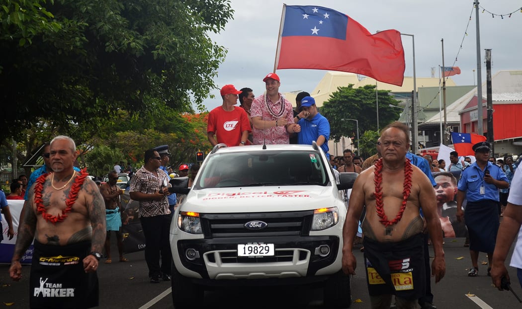 Joseph Parker parades through Apia in December 2016 after winning his WBO title.