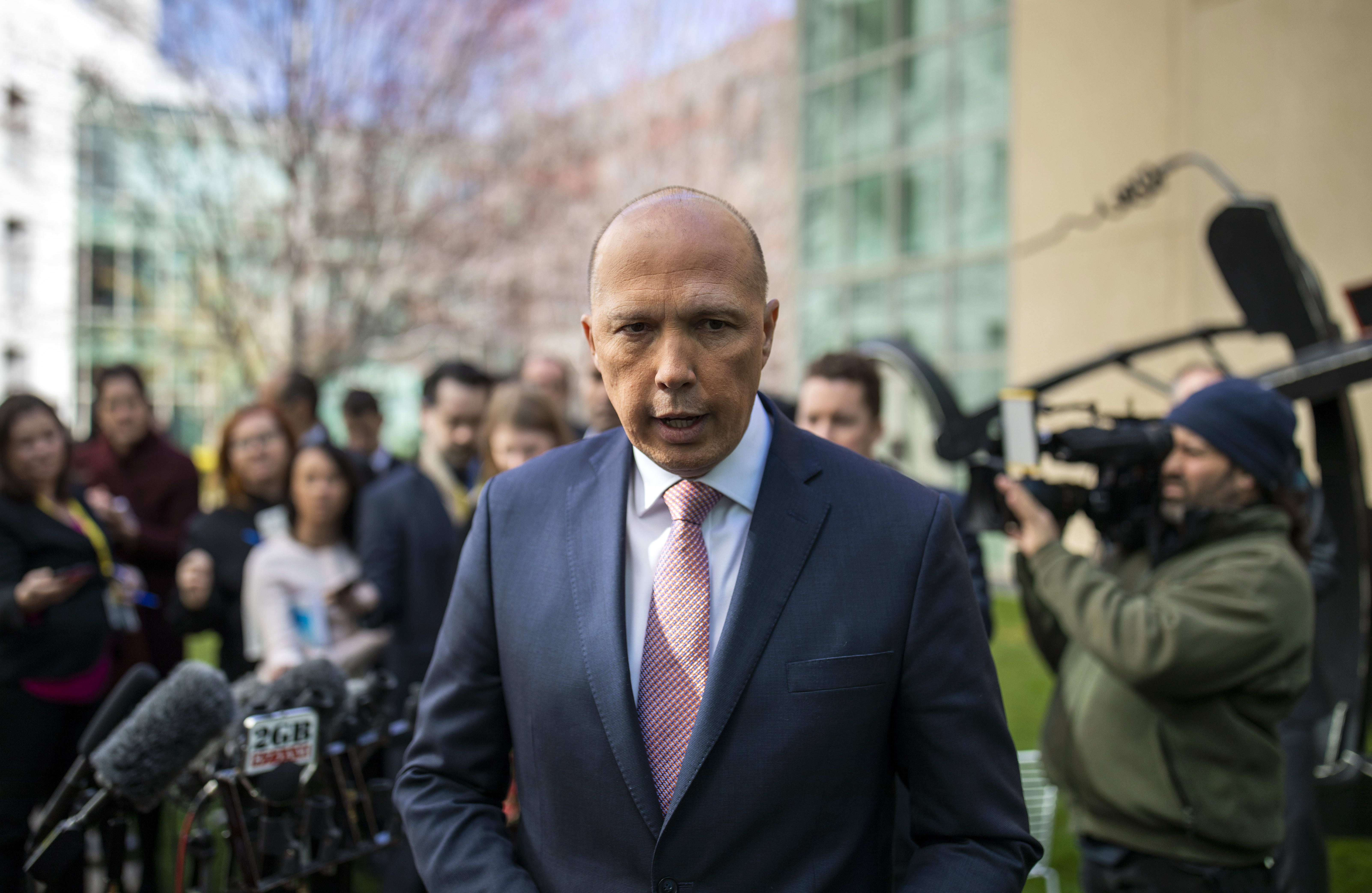 Australia's former home affairs minister, Peter Dutton, faces the media at a press conference in Canberra on August 21, 2018.