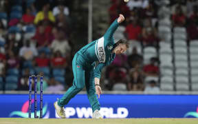 New Zealand's Lockie Ferguson bowls during the men's T20 World Cup cricket match between the West Indies and New Zealand.