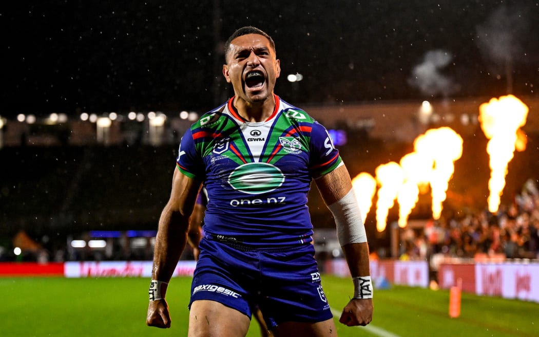 Marcelo Montoya of the Warriors celebrates a try against the Melbourne Storm.