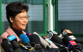 Carrie Lam casts her ballot in the local District Council elections in Hong Kong.