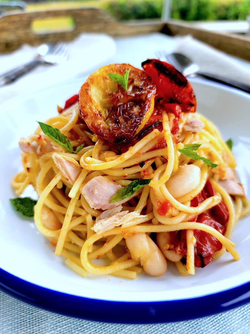 Pasta with white beans and roasted tomatoes.