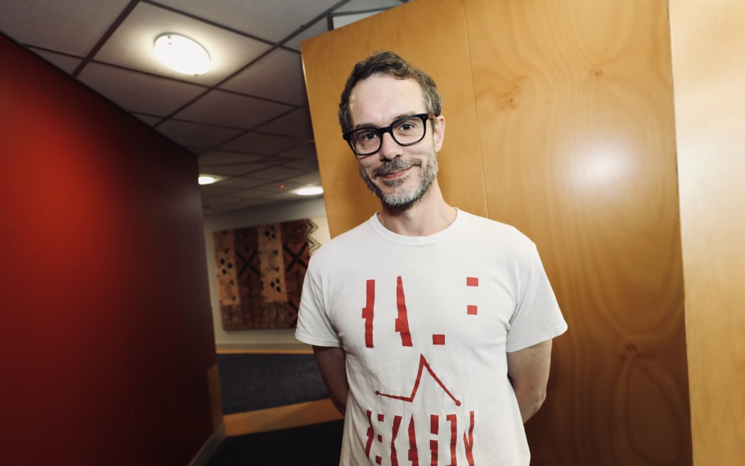 Tony Stamp wearing a NZ music T-shirt for NZ Music T-shirt Day 2024