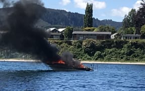 Boaties using the water near Kinloch Beach, Taupō, are urged to take care after a vessel caught fire and sank this afternoon.