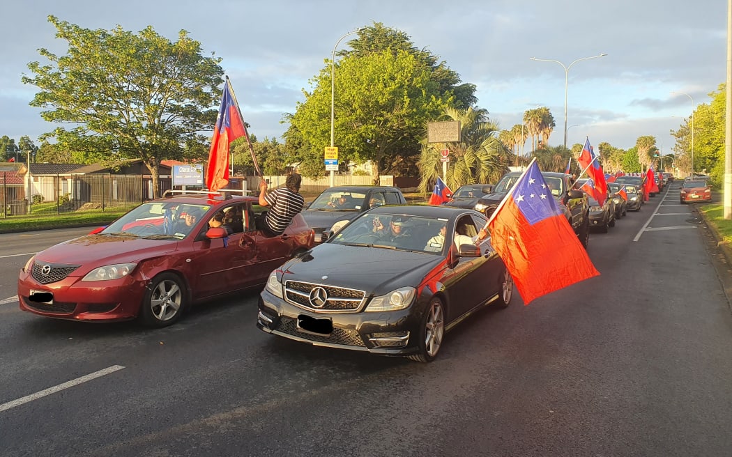 Samoa fans celebrating in Ōtara in South Auckland after Samoa stunned hosts England to reach the Rugby League World Cup final with a Golden Point victory in extra time after a semi-final had ended 26-26.