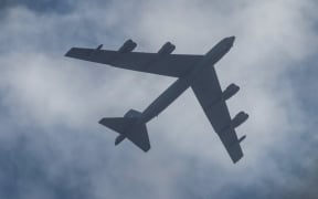 A US Air Force's B-52 bomber flies over Skopje, on August 22, 2022. Two US B-52 bombers, currently stationed at Fairford Air Force Base in the United Kingdom, are making low-flying flights over southeastern Europe to demonstrate the US commitment to the security of NATO allies located in the southeast of Europe, according to a press release. The bombers will fly over the government building in Skopje, Skanderbeg square in Tirana, the coast of Montenegro and Dubrovnik. (Photo by Robert ATANASOVSKI / AFP)