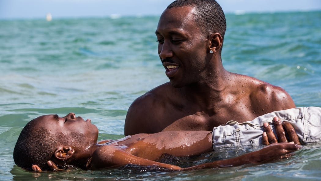 Mahershala Ali and Alex R. Hibbert in Moonlight (2016)