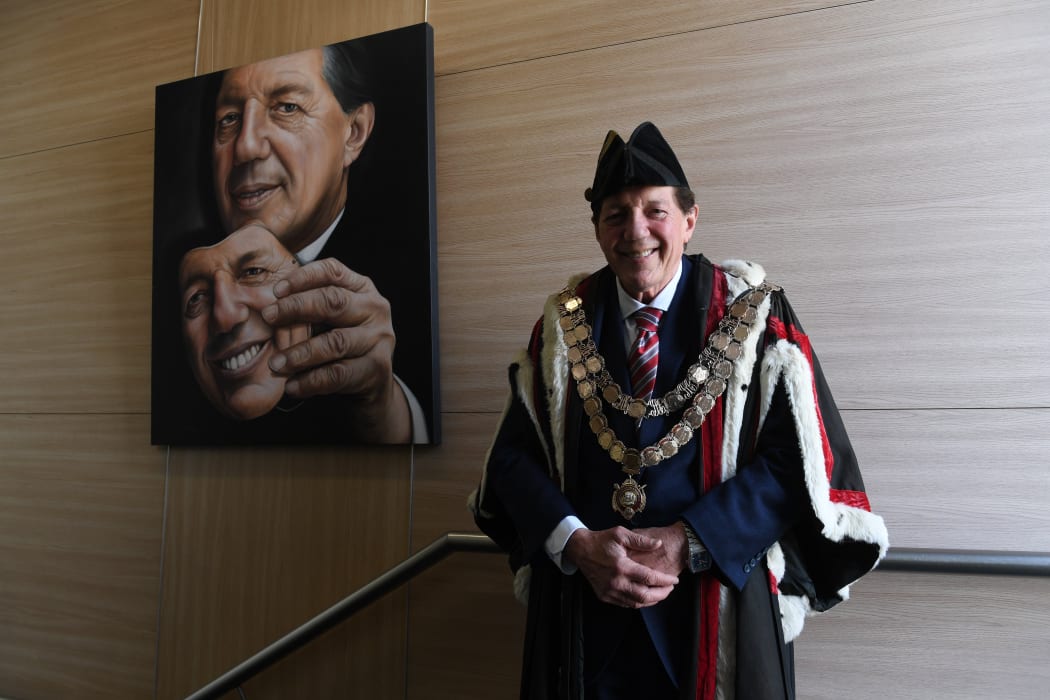 Mayor Shadbolt stands in front of his portrait in November, a piece that is titled Seriously.