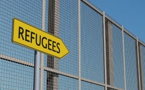 Refugee sign.
