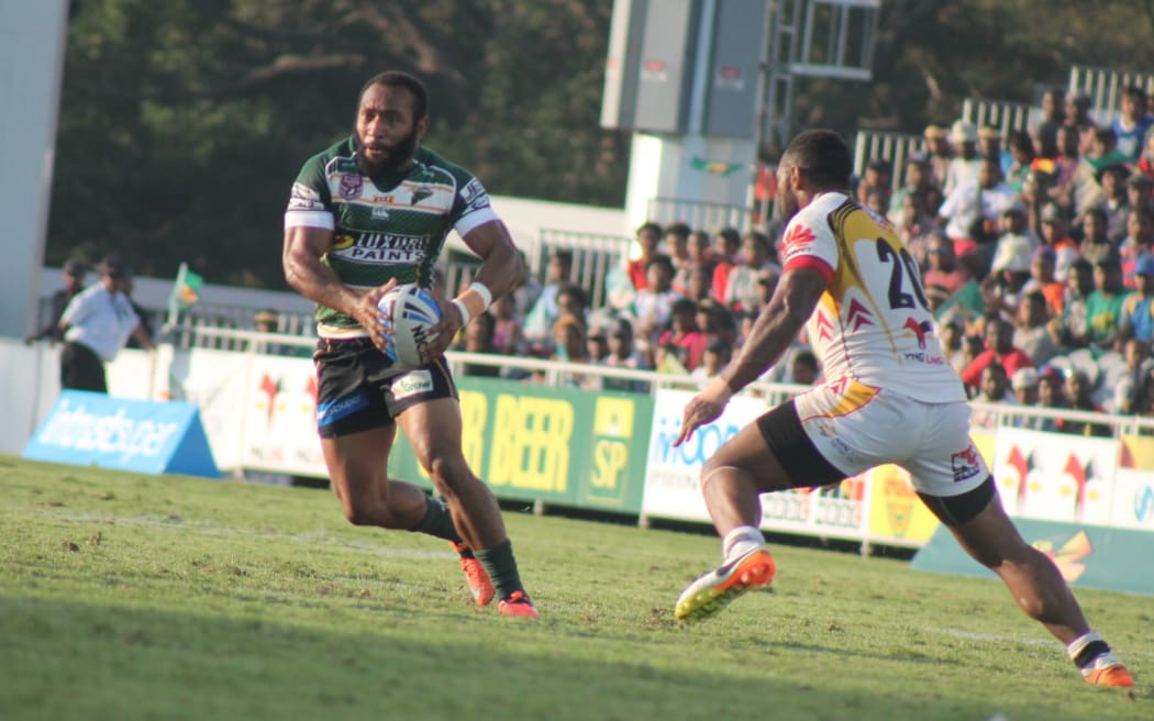 Sebastian Pandia looks to test the PNG Hunters defence.