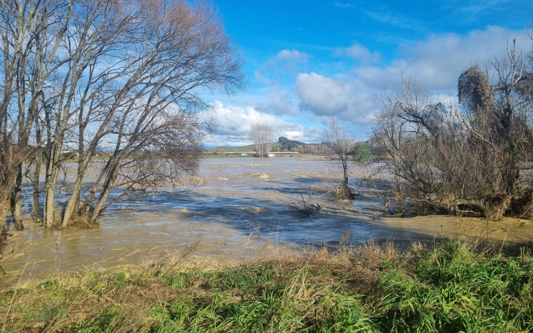 A severe weather event including heavy rain has caused the Motueka River to burst its banks and flood.