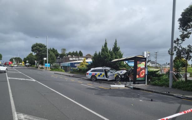 Delays for commuters after crash involving police car closes Auckland ...
