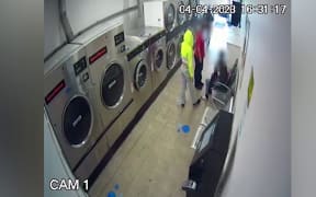 CCTV footage of young people huffing in a Hamilton laundromat.