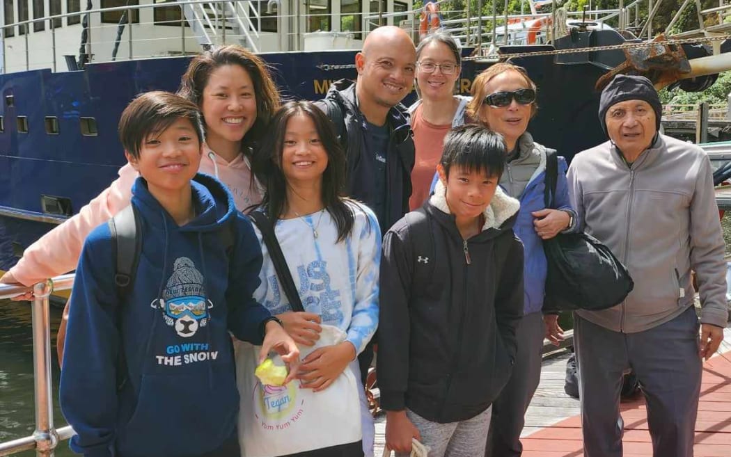 Tegan Ariel Chen with her family in the Milford Sound Port.