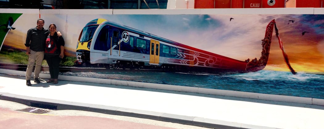 Galway Street's Te Waka Tūhono mural, with Berenize Peita whose vision it was and graphic designer Geoff Fitzpatrick who made it happen.