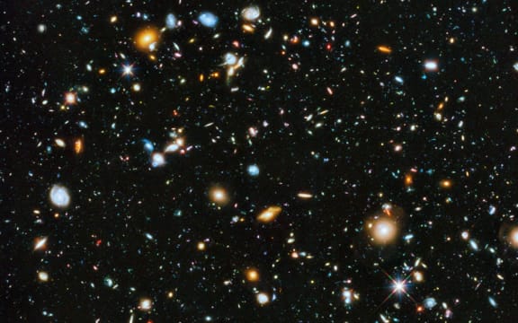 This Hubble image captures galaxies as far back as 400 million years after the Big Bang. James Webb will go back even further in time.