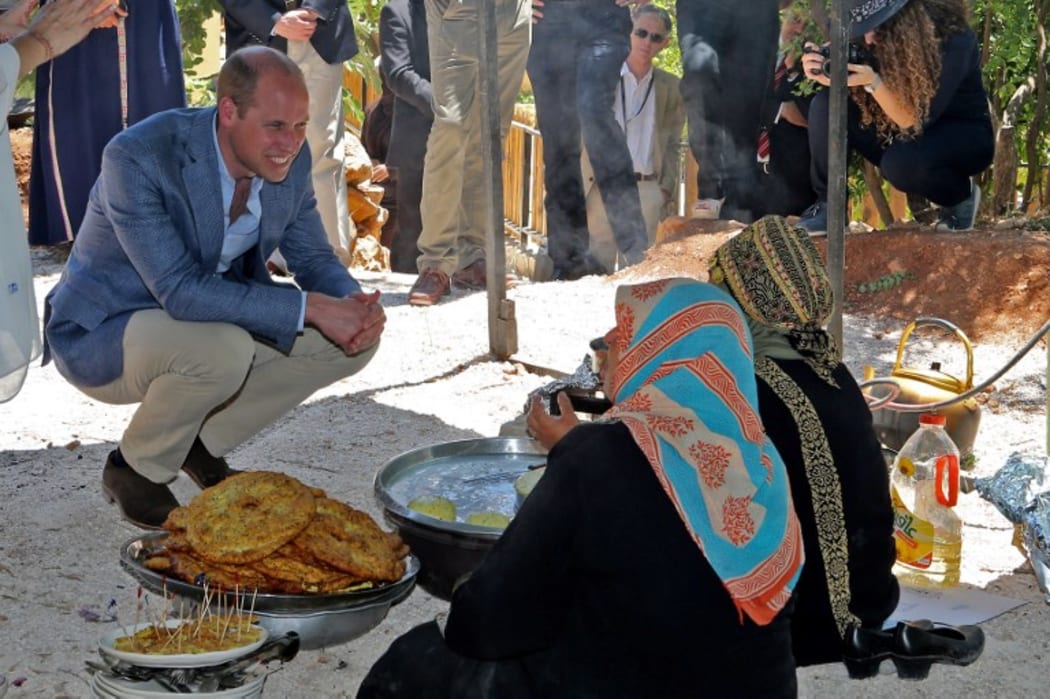Britain's Prince William visits the Princess Taghrid Institute for Development and Training in the province of Ajloun, north of the Jordanian capital Amman, on 25 June, 2018.