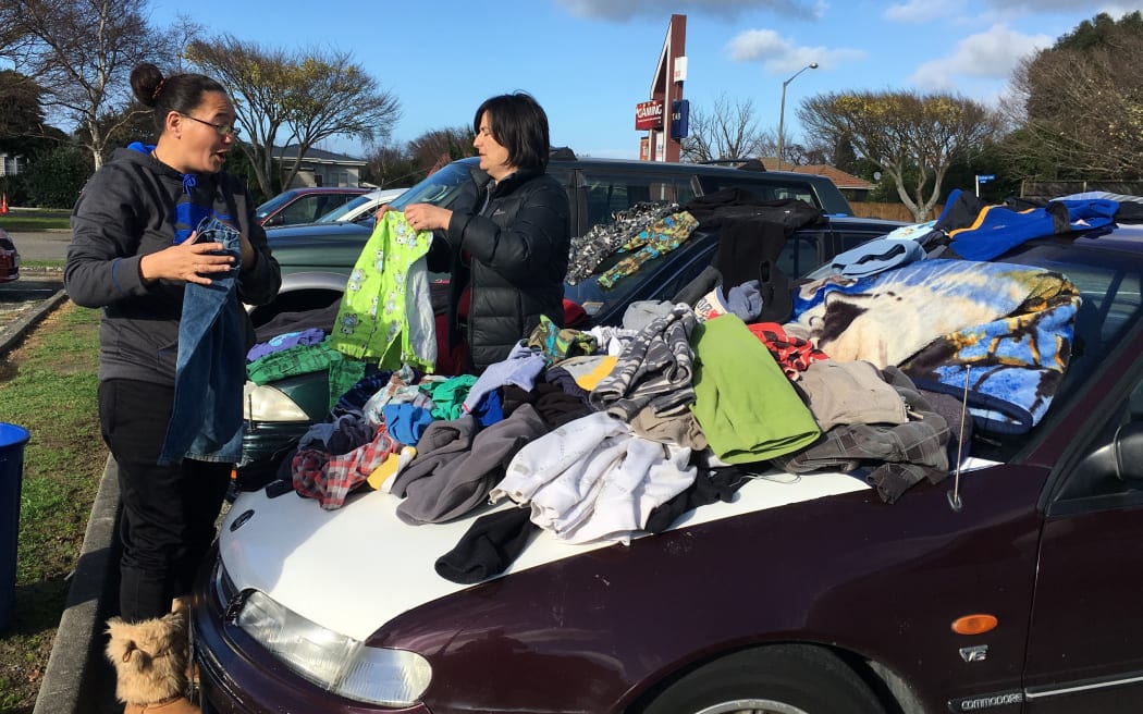 Police are calling on a suspected gunman to give himself up, as a Palmerston North suburb remains in lockdown for a second day.