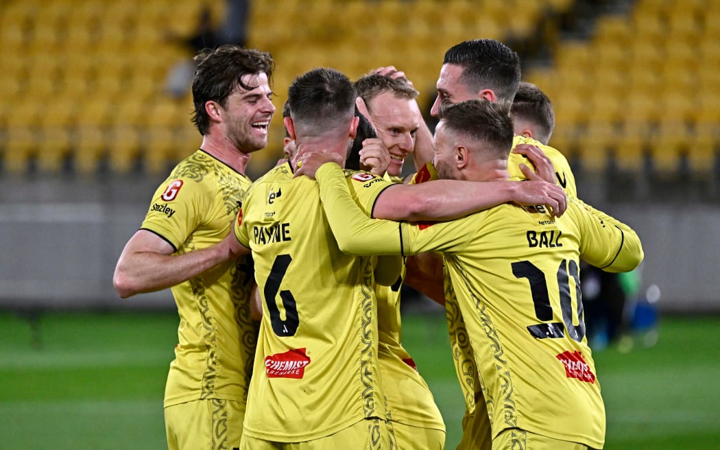 Kosta Barbarouses celebrates after scoring.