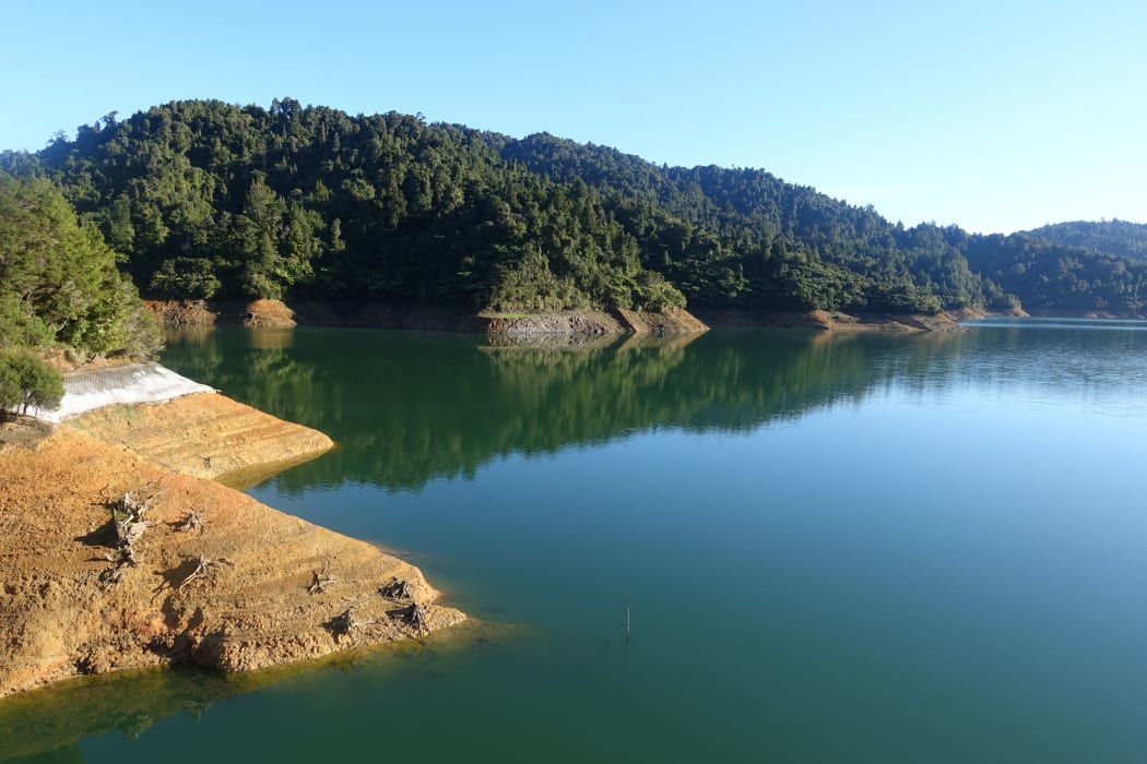 Mangatangi Dam (Watercare’s largest dam), showing low water levels, in the Hunua Ranges.