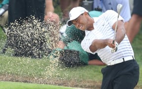 Tiger Woods hits from a bunker the PGA Championship.