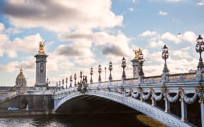 Pont Alexandre III and the dome of Les Invalides, Paris, France