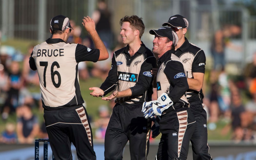 Black Caps bowler Lockie Ferguson congratulated after taking a wicket.
