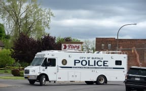 A City of Buffalo police van is seen outside the scene of the shooting in Buffalo, New York.