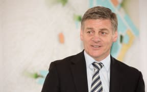Bill English at a social housing announcement in Northcote