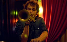 Finn Scholes is "one of the hottest young brass players in [Auckland] city", says Atkinson.