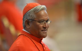 The then Bishop of Tonga, Soane Patita Paini Mafi, arrives to attend a papal consistory for the creation of new Cardinals, on February 14, 2015 at St. Peter's basilica in Vatican.