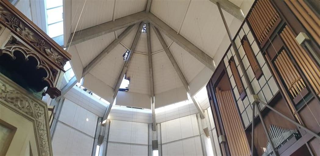 Damage is visible in the roof of St Paul's Cathedral in Dunedin after an early morning fire.