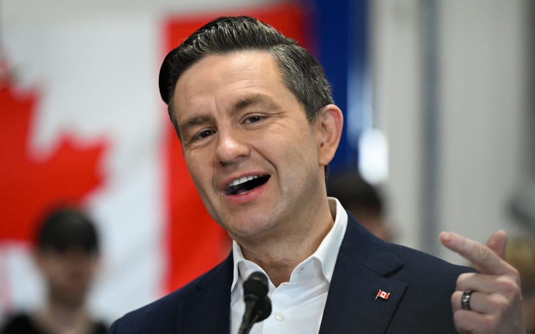 EDMONTON, CANADA – APRIL 8:
Pierre Poilievre, Leader of the Conservative Party of Canada and the Official Opposition, addresses the media during a press conference at Trail Tire Tamarack in Edmonton, Alberta, Canada, on April 8, 2025. Poilievre announced plans to ensure the ultra-rich can no longer hide their money abroad to avoid paying their fair share at home, while working Canadians are punished with higher taxes. (Photo by Artur Widak/NurPhoto) (Photo by Artur Widak / NurPhoto / NurPhoto via AFP)