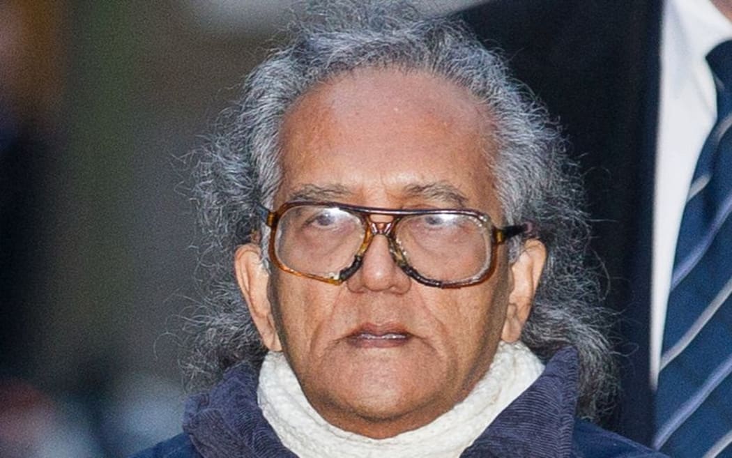 Maoist activist Aravindan Balakrishnan arrives at Southwark Crown Court in London on January 6, 2015. Balakrishnan is charged with 25 offences including rape and child cruelty and false imprisonment relating to three women between January 1980 and October 2013. AFP PHOTO / ANDREW COWIE