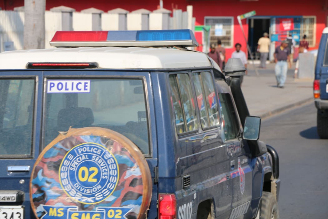 A police landcruiser patrols the streets of the Papua New Guinea capital Port Moresby.